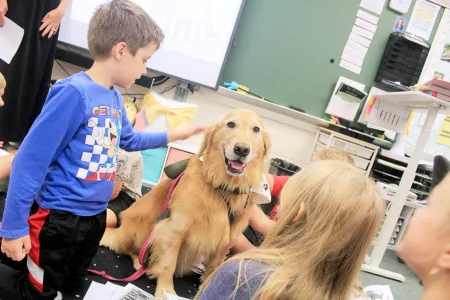 Puppy love: Foot of Ten therapy dog spreads joy in classrooms